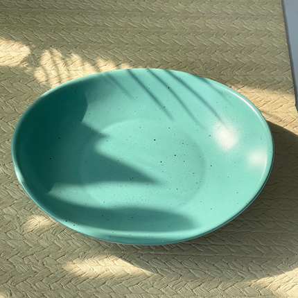 8.5"x7.5" Curved Dessert Bowl ( Firozi Matte with Black Specks )